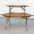 Celina Tent Serpentine Bar Top Inner Edge, image of a curved wooden bar top with mounting support structure and metal legs.