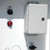 Wisperkool 20 Ton HVAC, industrial cooling system with control switches and remote T-STAT for temperature regulation.