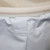 Elastic Barrel Cover, Open Top - close-up image showing the elasticized top rim of a light blue cover designed to fit over a barrel with an open top for protection and containment.