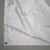 35' x 35' Polyester Drop Cloth, close-up view of the white protective covering with reinforced edges and grommet for securing during painting or renovation projects.