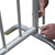 96-inch Crowd Control Barrier, close-up of metal frame assembly showing hands connecting the metal components, durable and portable security barrier for crowd management.