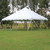 Celina Tent 20' x 20' Classic Series Pole Tent, 1 Piece Tent Top, Complete, outdoor event tent set up on grassy area with trees in the background.