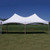 Celina Tent 15' x 30' Pinnacle Series High Peak Frame Tent / Cross Cable Marquee, complete setup of a large, white high peak event tent with cross cable support, set on grass under a clear blue sky.