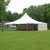 Celina Tent 40' x 40' Premiere I Series High Peak Pole Tent, Sectional Tent Top, Complete, set up outdoors on a grassy area with trees in the background.