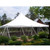 Celina Tent 60' x 60' Premiere II Series High Peak Pole Tent, Sectional Tent Top, Complete, white outdoor marquee set up in a garden with trees and shrubs.