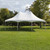 20' x 30' Master Series High Peak Frame Tent, 1 Piece Tent Top, Complete, outdoor event tent set up on grass with a high peak design and sturdy frame.