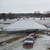 Celina Tent 40' x 60' Classic Series Frame Tent, Sectional Tent Top, Complete, set up on a snowy field for an event or gathering.