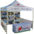 Celina Tent Fast Shade Package 10-7, portable canopy tent with promotional banners and table cover, used for outdoor events and branding.
