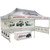 Celina Tent Fast Shade Package 20-5, a portable white shade tent with promotional graphics and images of vehicles, set up for outdoor events or displays.