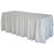 Celina Tent 13' White Polyester Skirting, white pleated fabric covering the sides of a rectangular table for event decor.
