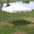 Celina Tent 10 x 10 Classic Series Frame Tent, 1 Piece Tent Top, Complete, white outdoor canopy tent set up on grassy area near water with metal frame supports