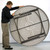 Mayfield Chair and Round Resin Table Set, image showing the underside of the round table with its support structure and mechanisms.