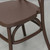 Chocolate Dover Cross Back Chair, close-up view highlighting the smooth, curved seat and cross-back design in a rich chocolate color.