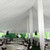 20' x 40' Classic Pole Tent Liner, white fabric ceiling drapes and tent interior setup for event.