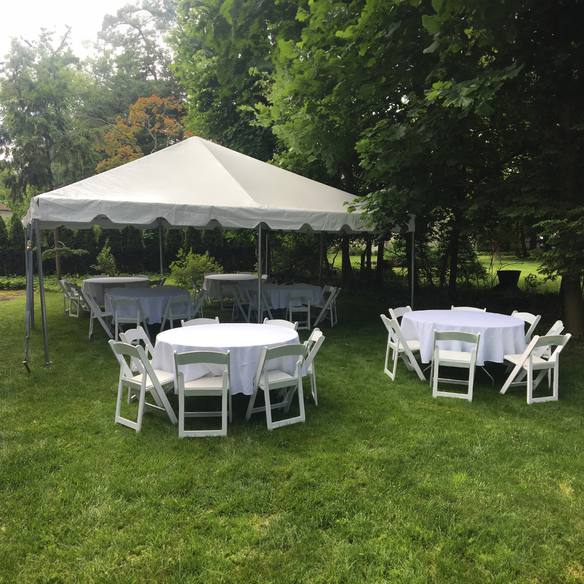 Party rental equipment inventory including tents, tables, chairs, and accessories prepared for efficient event setup