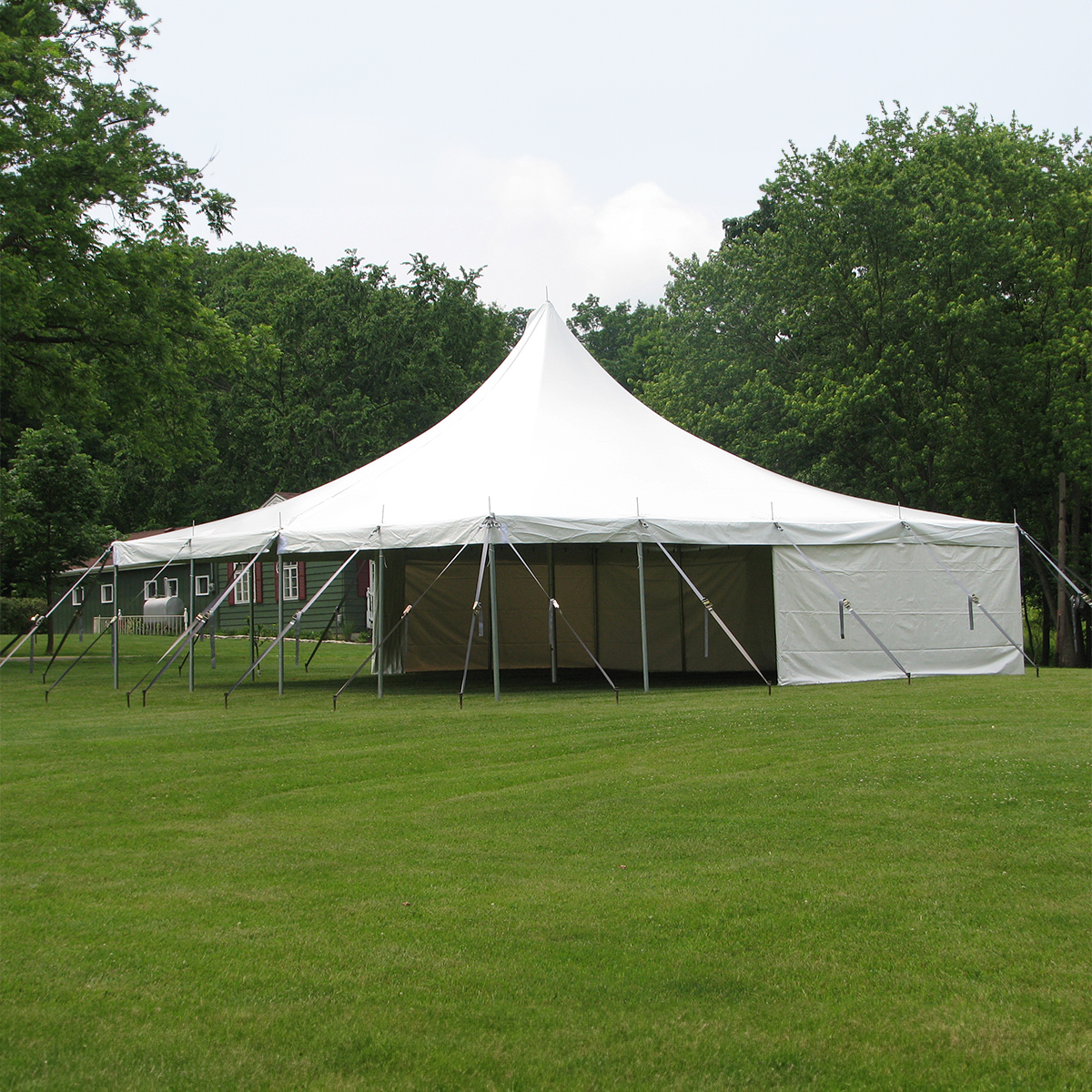 Event tent setup with sidewalls and clean branding