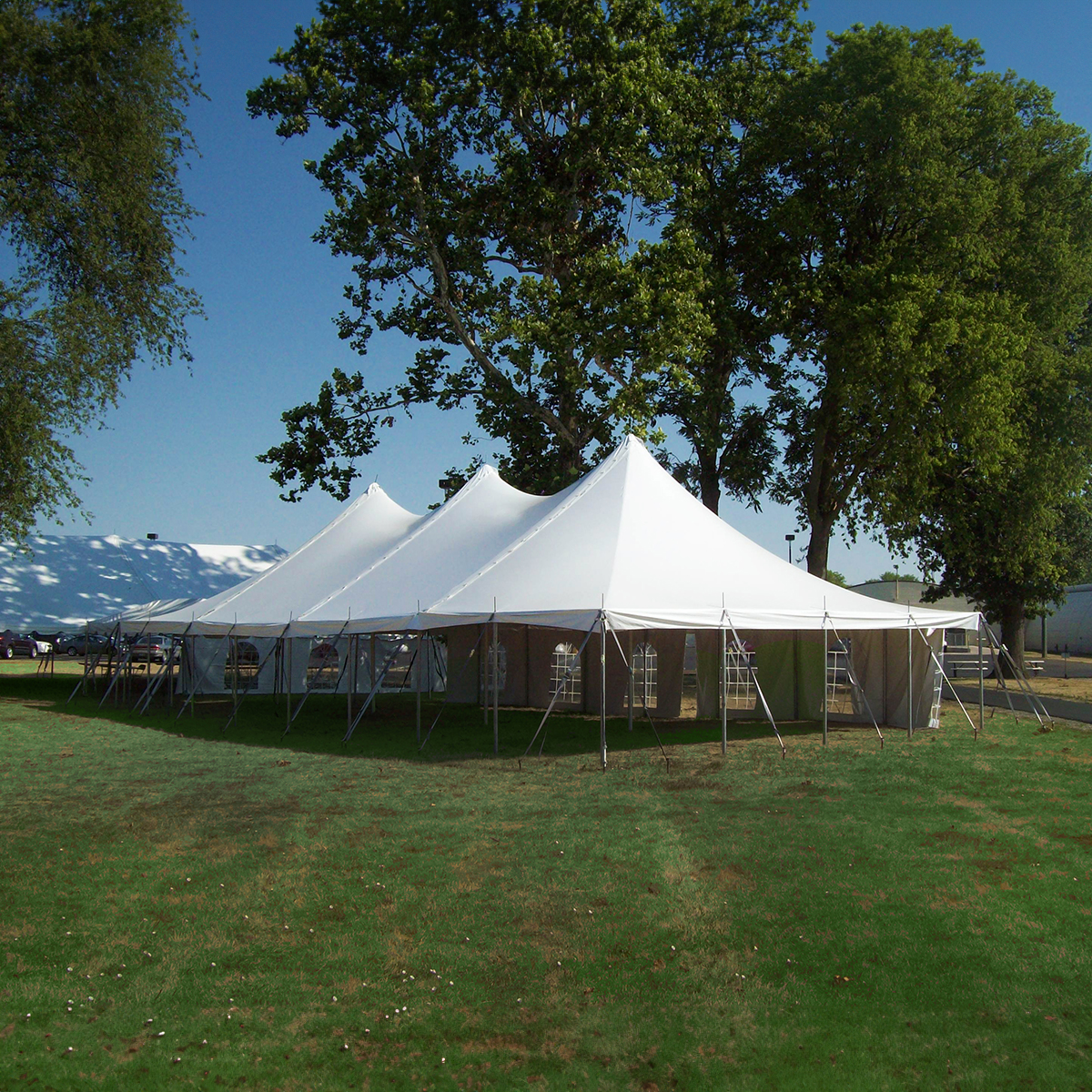 High peak pole tent at an elegant outdoor wedding reception