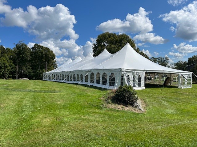 Party tent sidewalls at an outdoor event