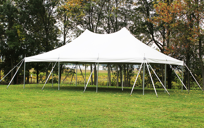 Heavy duty party tent set up for an outdoor event with clean tension and stable frame