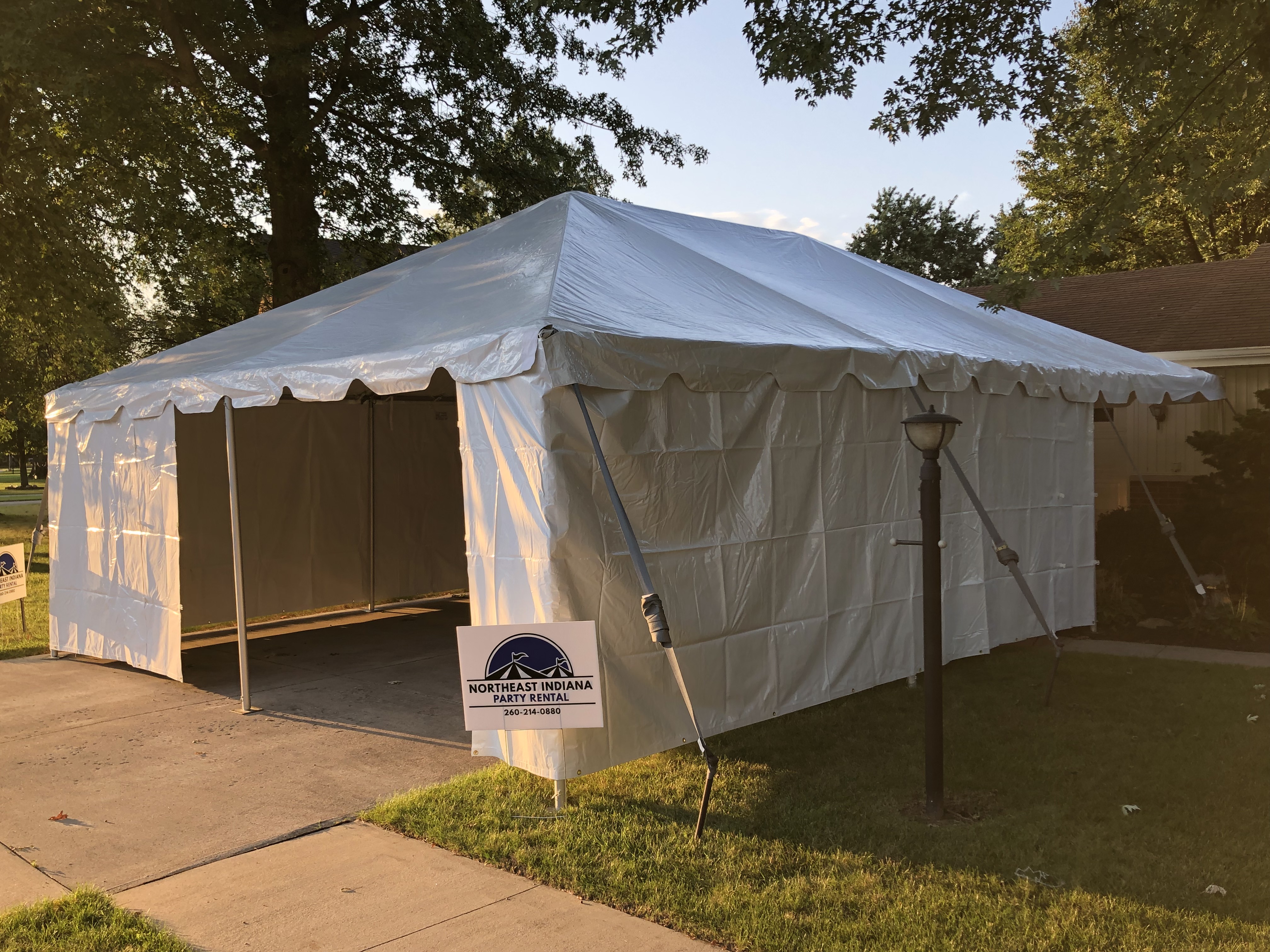 Canopy tent with sidewalls installed at an outdoor event