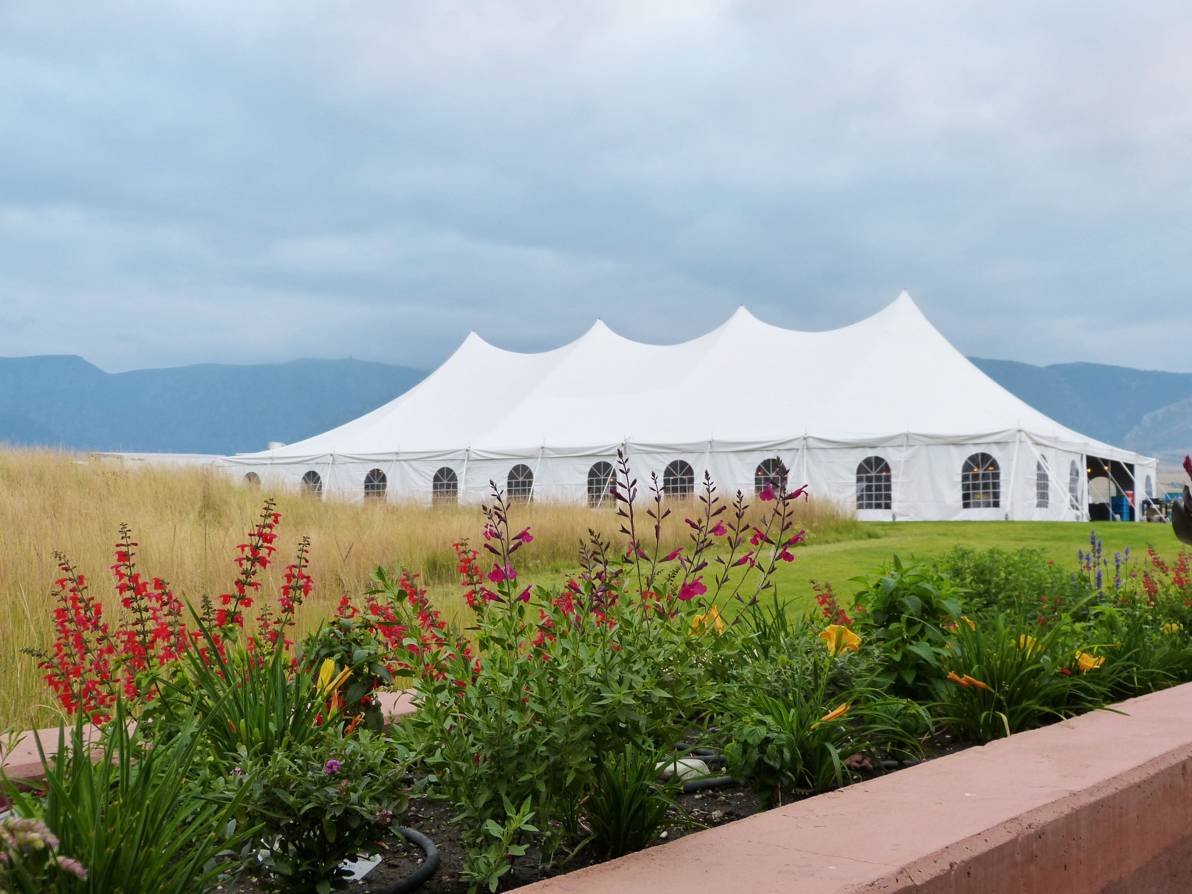 Elegant tent wedding setup with natural lighting