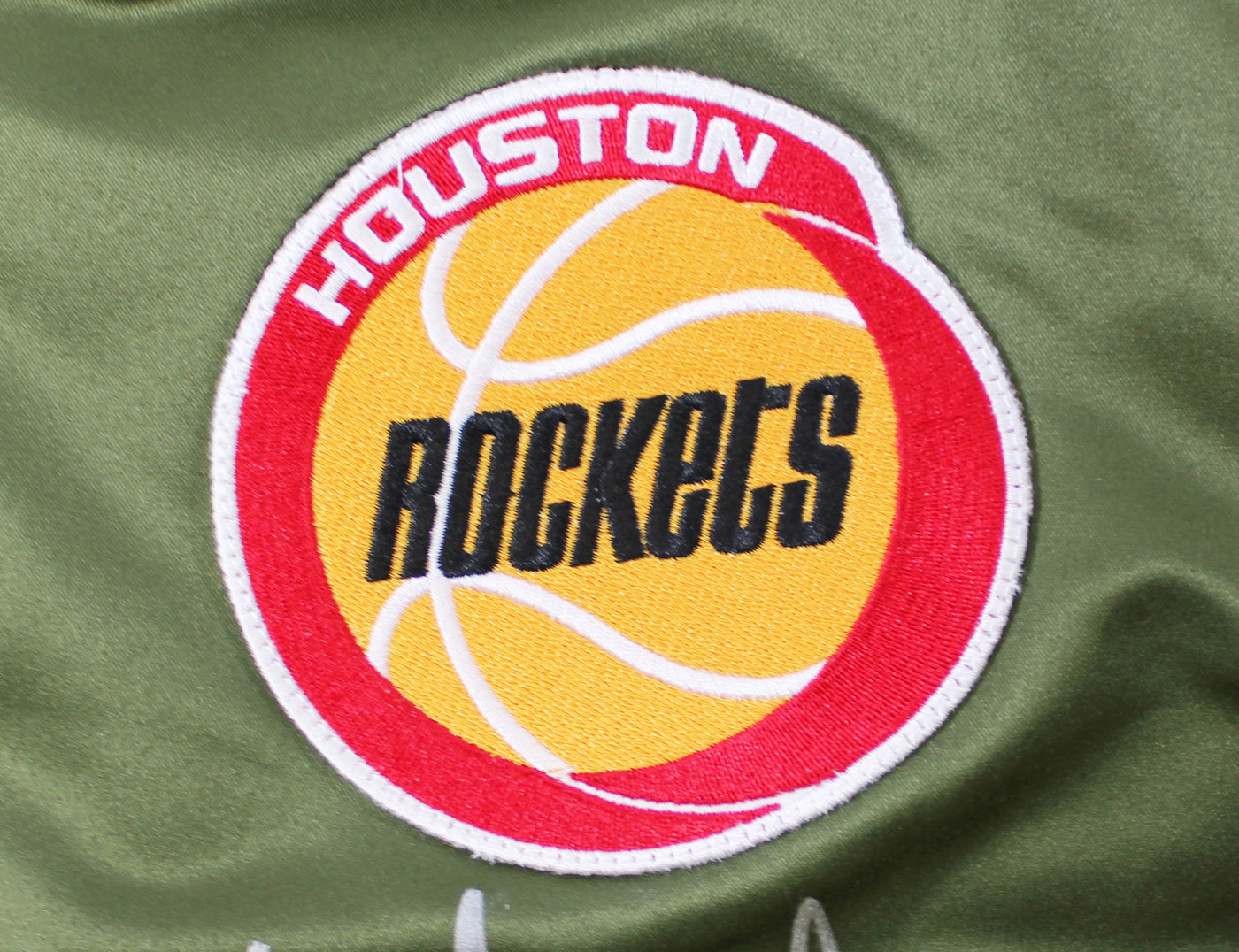Rockets Hakeem Olajuwon & Clyde Drexler Signed Green M&N Bomber