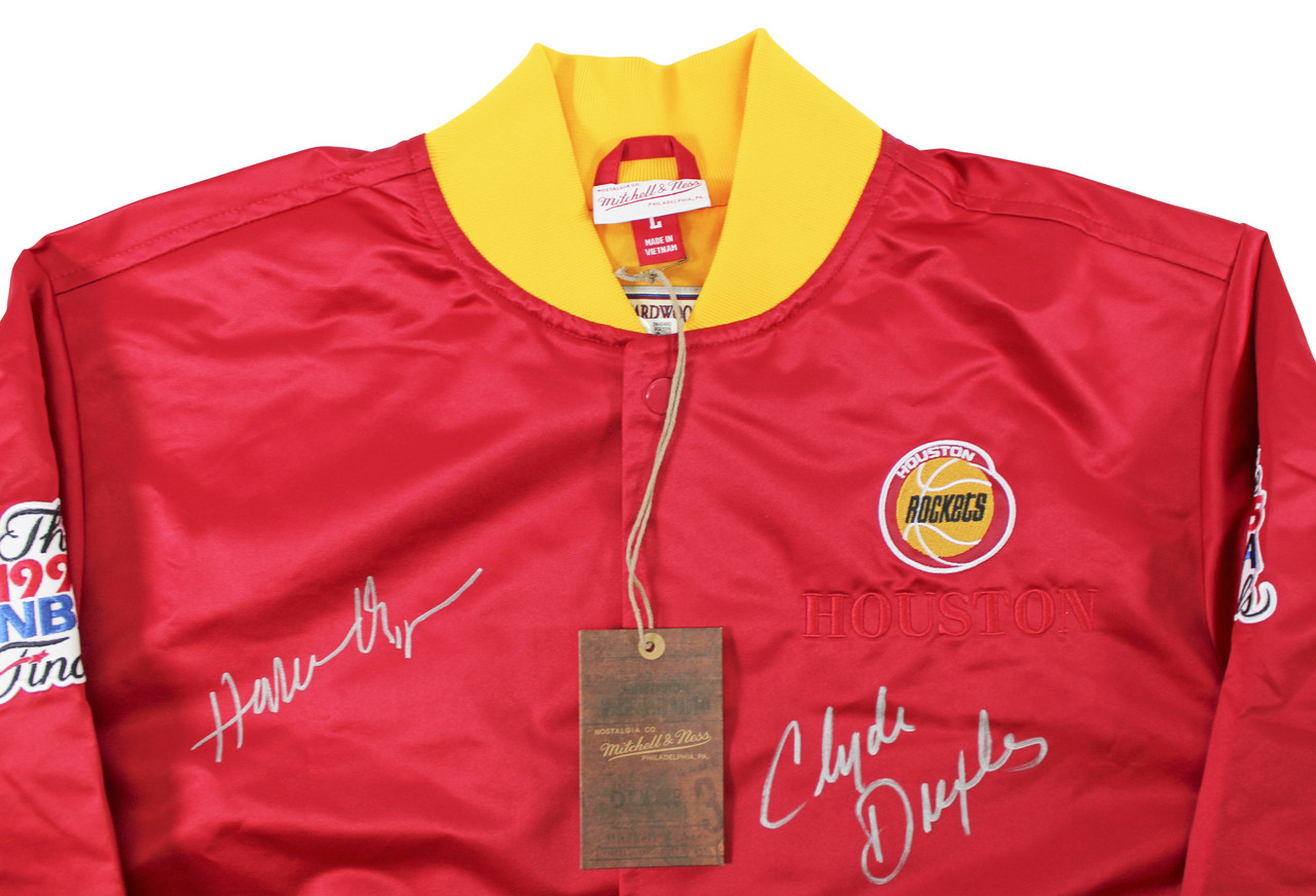 Rockets Hakeem Olajuwon & Clyde Drexler Signed Red M&N Bomber
