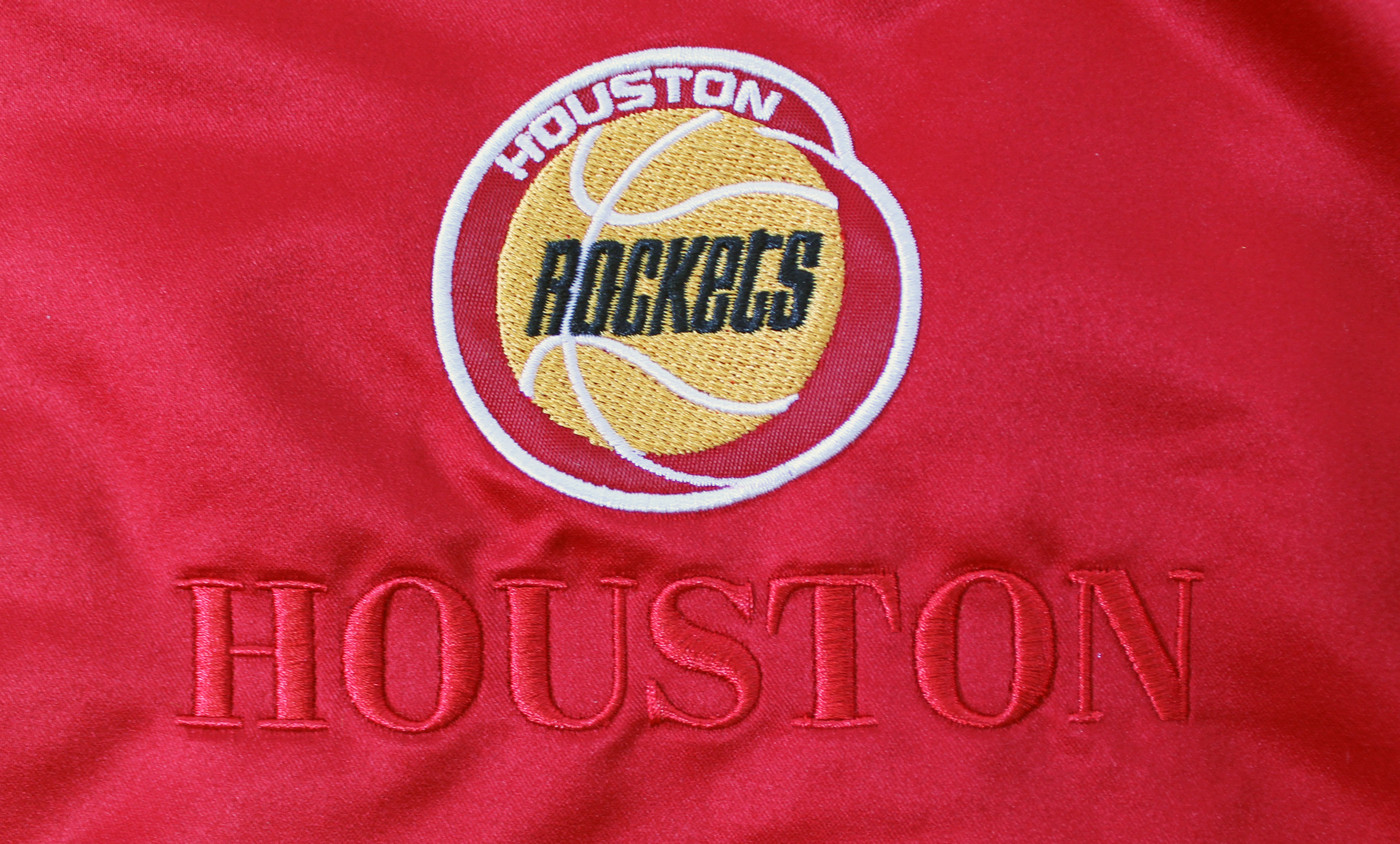 Rockets Hakeem Olajuwon & Clyde Drexler Signed Red M&N Bomber