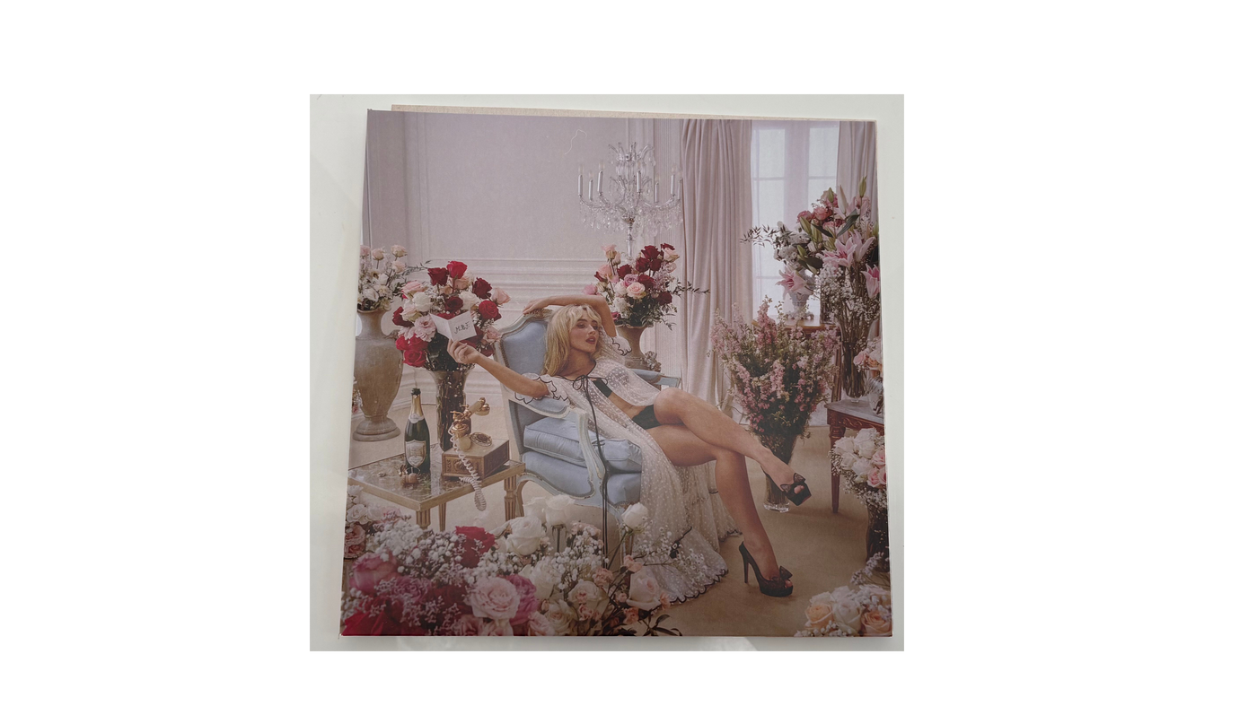 Sabrina Carpenter with Light Blue Vinyl "Man's Best Friend"