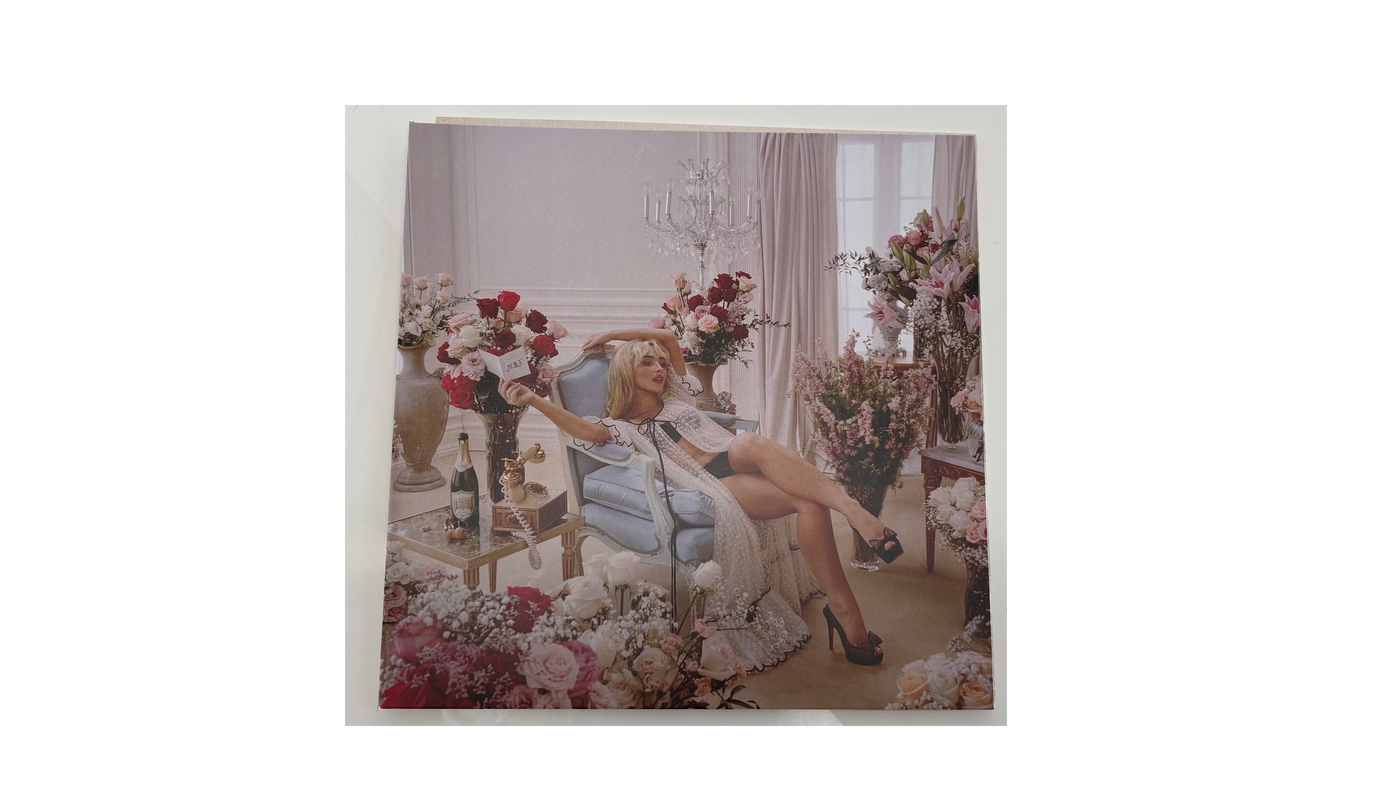 Sabrina Carpenter with Pink Vinyl "Man's Best Friend"