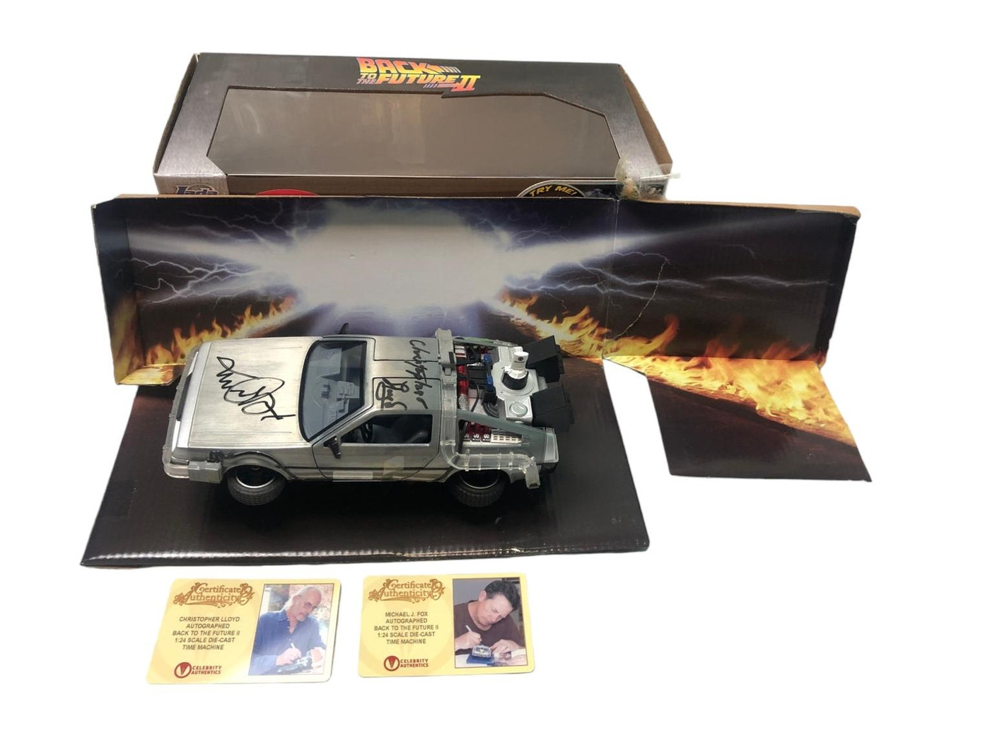 Michael J. Fox & Christopher Lloyd Signed 1:18 Scale DeLorean Time Machine – Celebrity Authentics Witnessed