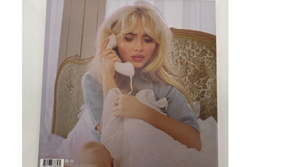 Sabrina Carpenter with Pink Vinyl "Man's Best Friend"