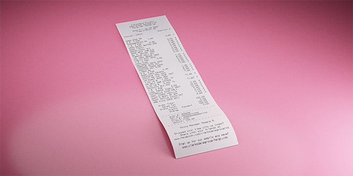 Thermal receipt sitting on a red surface