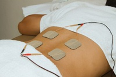 Lower Back Physical Therapy with TENS Electrode Pads, Transcutaneous  Electrical Nerve Stimulation Stock Photo