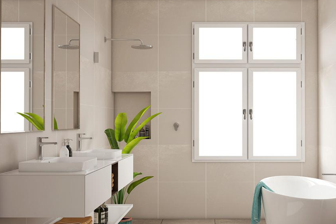 Dual wash basin sinks on a floating shelf, overhead shower, leafy plants, window, and adjacent freestanding bath