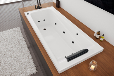 Undermount white freestanding bath set against a stylish wooden mount