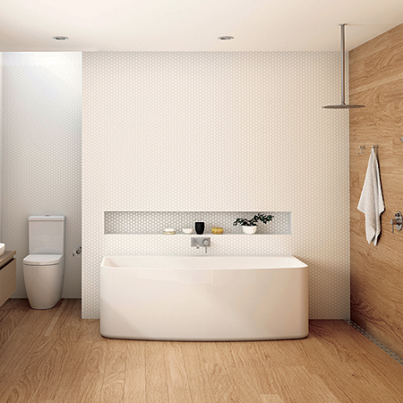 Toilet, back-to-wall bath, overhead shower, and wall-mounted towel holder against a white & wooden backdrop with wooden flooring