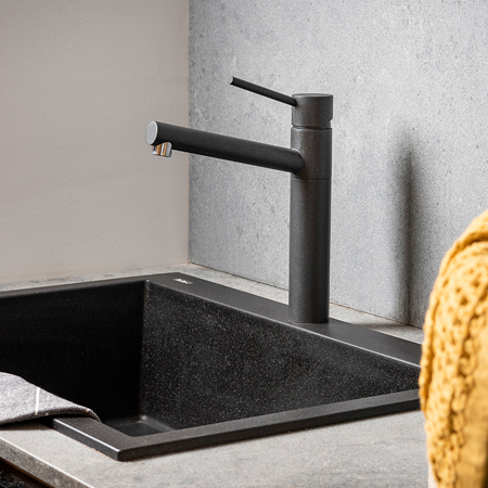 Modern black laundry tub and tap arrangement
