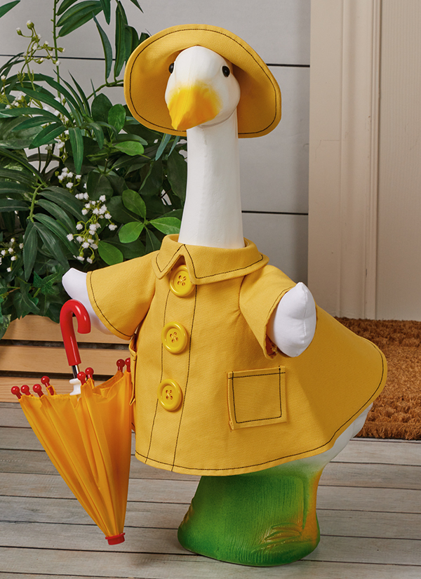 Goose statue in yellow raincoat and hat