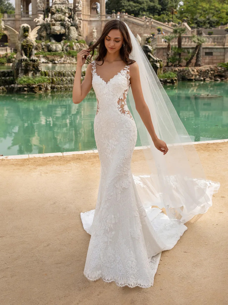 MOROCCO Wedding Dress By Pronovias Wedding dress in lace with mermaid cut, V-neck and tattoo-effect back