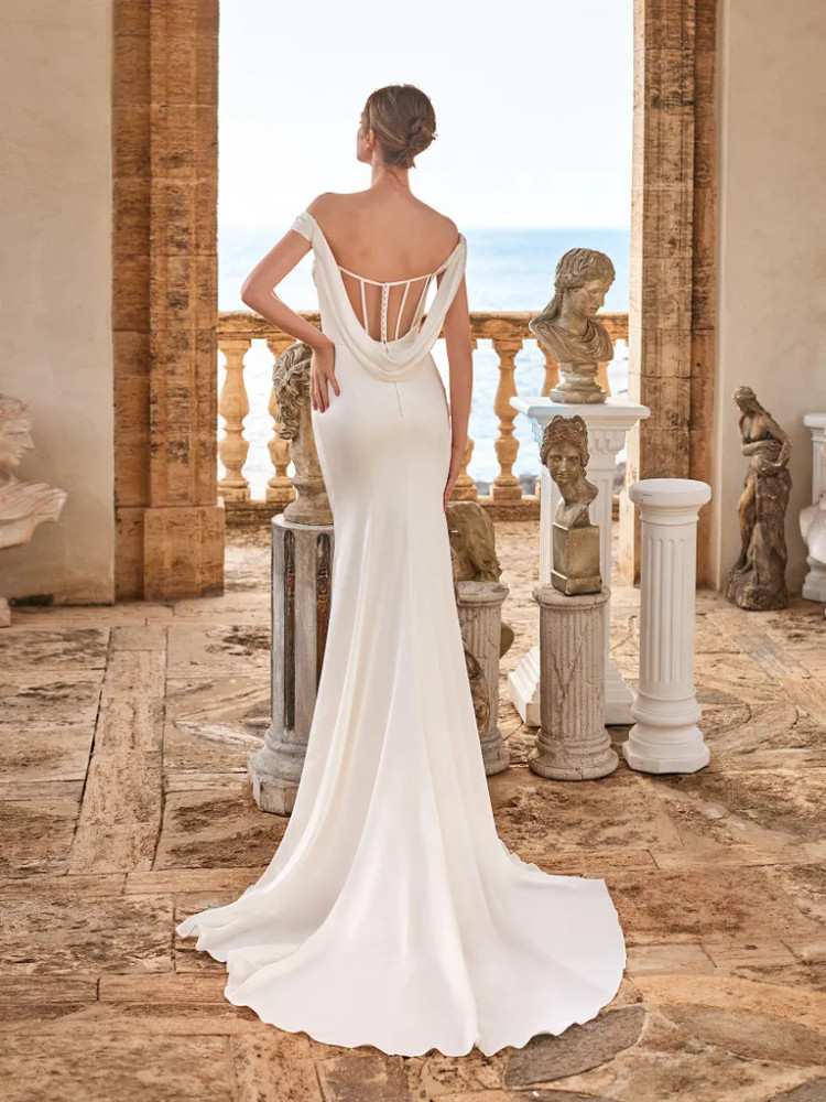 FEME Wedding Dress by Pronovias Sleeveless mermaid wedding dress with off  the shoulder V-neck and low corset back