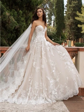 Elcira Wedding Dress by Pronovias  Wedding dress with open back, princess cut and sweetheart neckline