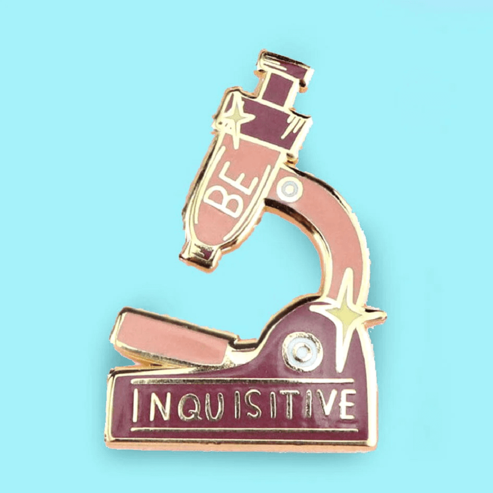 Jubly-Umph - Be Inquisitive Lapel Pin in the shape of a microscope is the perfect accessory for those who seek knowledge and have an inquisitive mind.