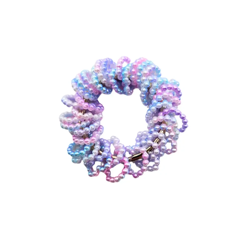 Dinky Things Fidgets - Pearly Hearts is a gorgeous fidget with textured heart shaped beads that make a sweet tinkling sound for fun sensory input.