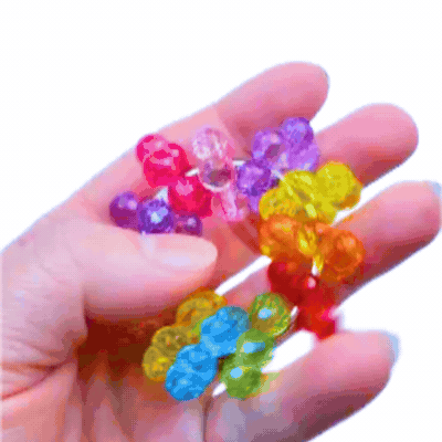 Meet the Dinky Things XL Fidgets - Bauble, a bigger, chunkier version of the original Bauble with colourful beads, tactile texture and satisfying fidget movement.