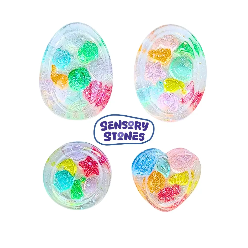 Handmade Sensory Stones - Sparkle Sea Worry Stone by Sensory Oasis for Kids. Smooth resin sensory stones with raised ocean-inspired details for tactile sensory input and pocket-sized calm.