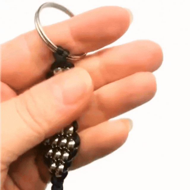 The Cosmic Metal Fidgets - Cetus Keychain Double features smooth stainless steel beads in a flexible woven keychain design for calming tactile sensory input wherever you go.