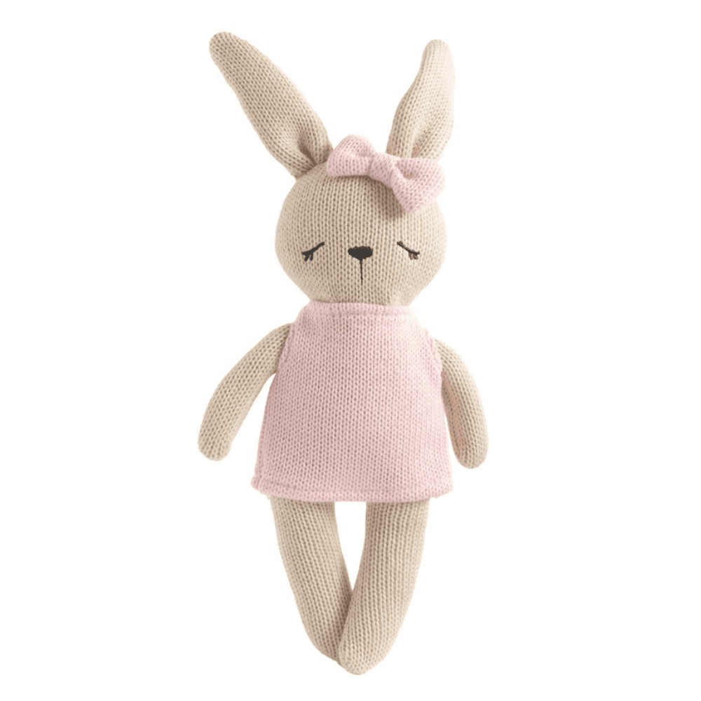 Meet Bella the Bunny, a soft 100% cotton knitted comfort toy with embroidered details, pink dress and bow. Perfect for cuddles, sensory play and gifting.