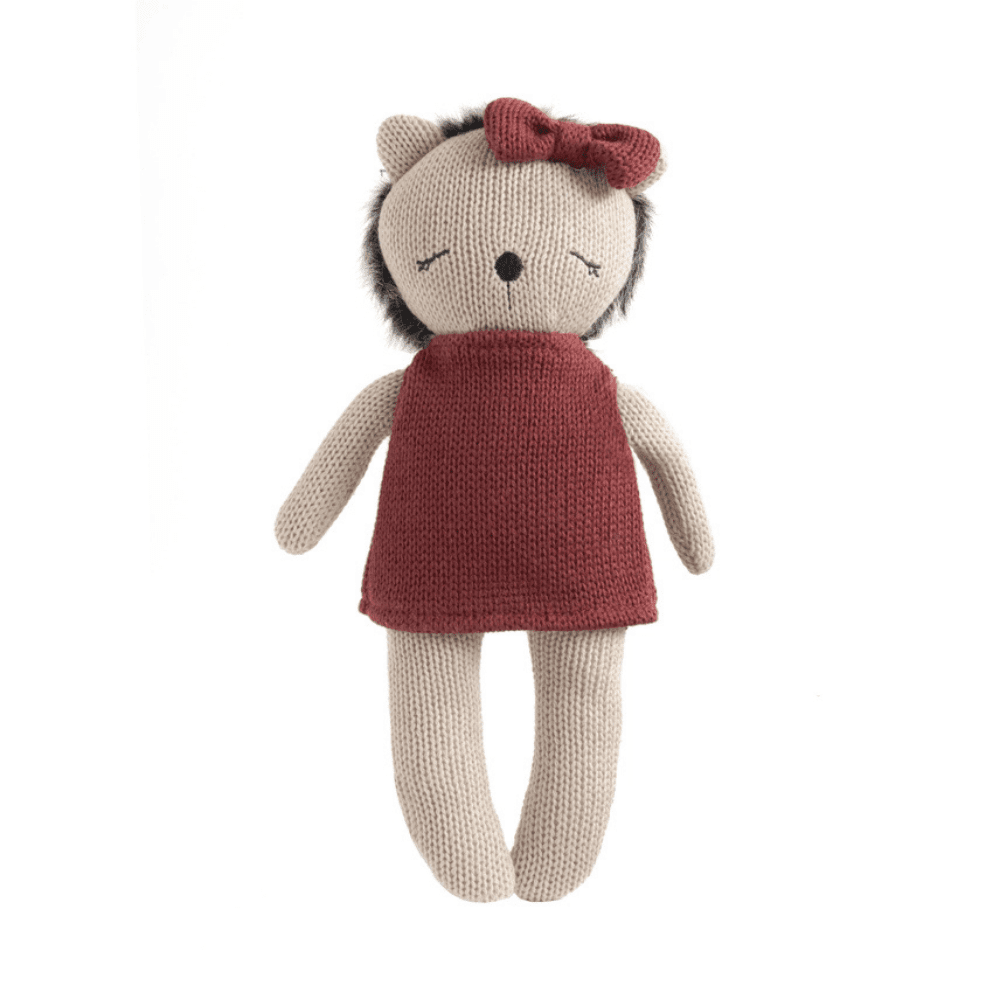 Meet Helen the Hedgehog, a soft 100% cotton knitted toy with plush detailing, embroidered features and a cosy dress. Perfect for cuddles and sensory play.