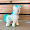 CaaOcho - Mira the Unicorn Teether is perfect for mouthing babies, while a squeaker offers another stimulating sensory experience.